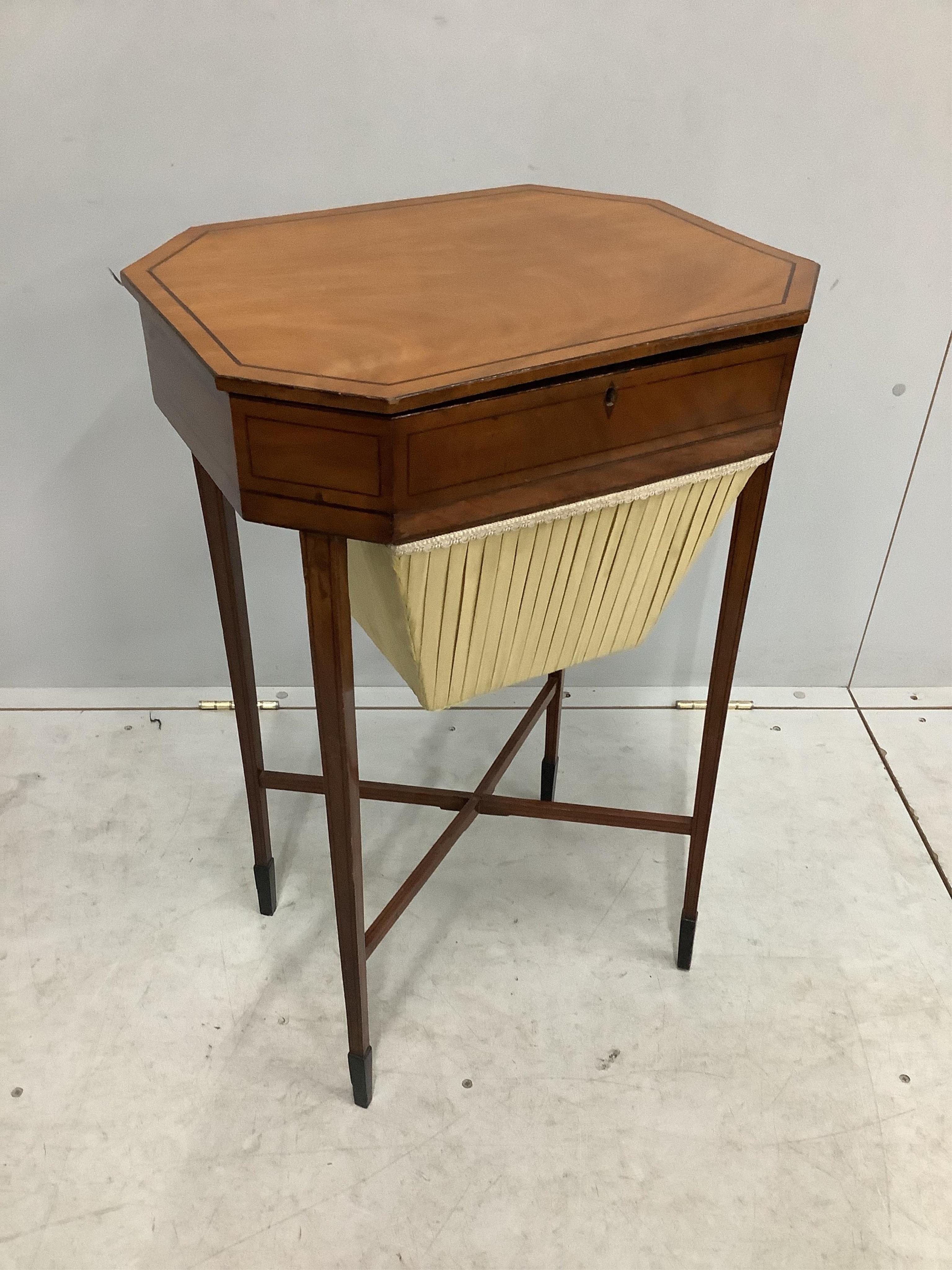 A George III octagonal satinwood work table, width 48cm, depth 37cm, height 74cm. Condition - good